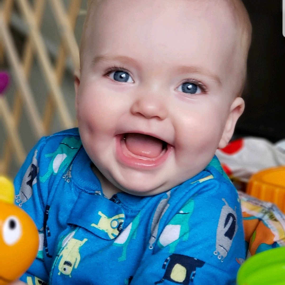 Jovi is registered to the contest to win money with this photo: baby, baby_playing_with_toys, baby_products, cheek, child, eye, face, facial_expression, head, iris, lip, mouth, nose, person, play, product, skin, smile, toddler, toy