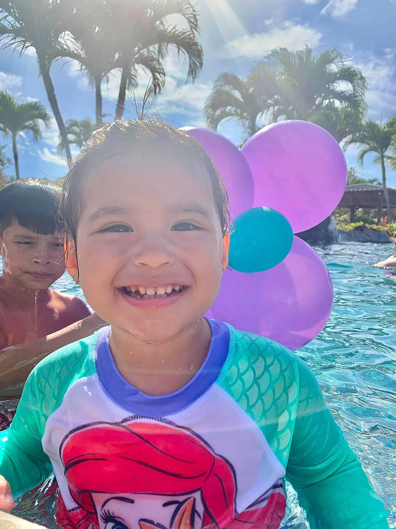 Kassandra is registered to the contest to win money with this photo: balloon, child, cool, eye, face, facial_expression, fun, happy, head, joy, leisure, people, person, pink, skin, sky, smile, summer, toddler, tree