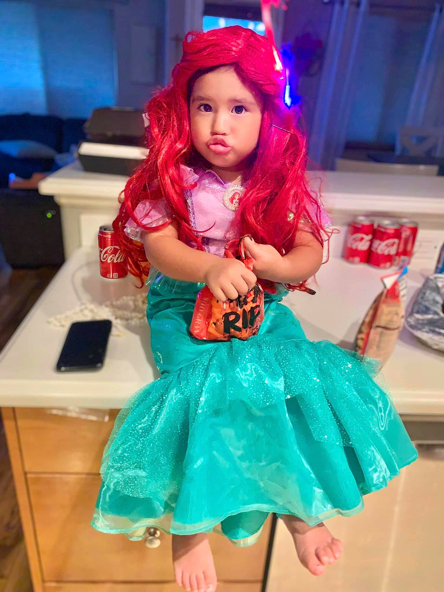 Kassandra is registered to the contest to win money with this photo: blue, child, child_model, clothing, cosplay, costume, dress, electric_blue, fictional_character, hair_coloring, headwear, person, pink, red_hair, toddler