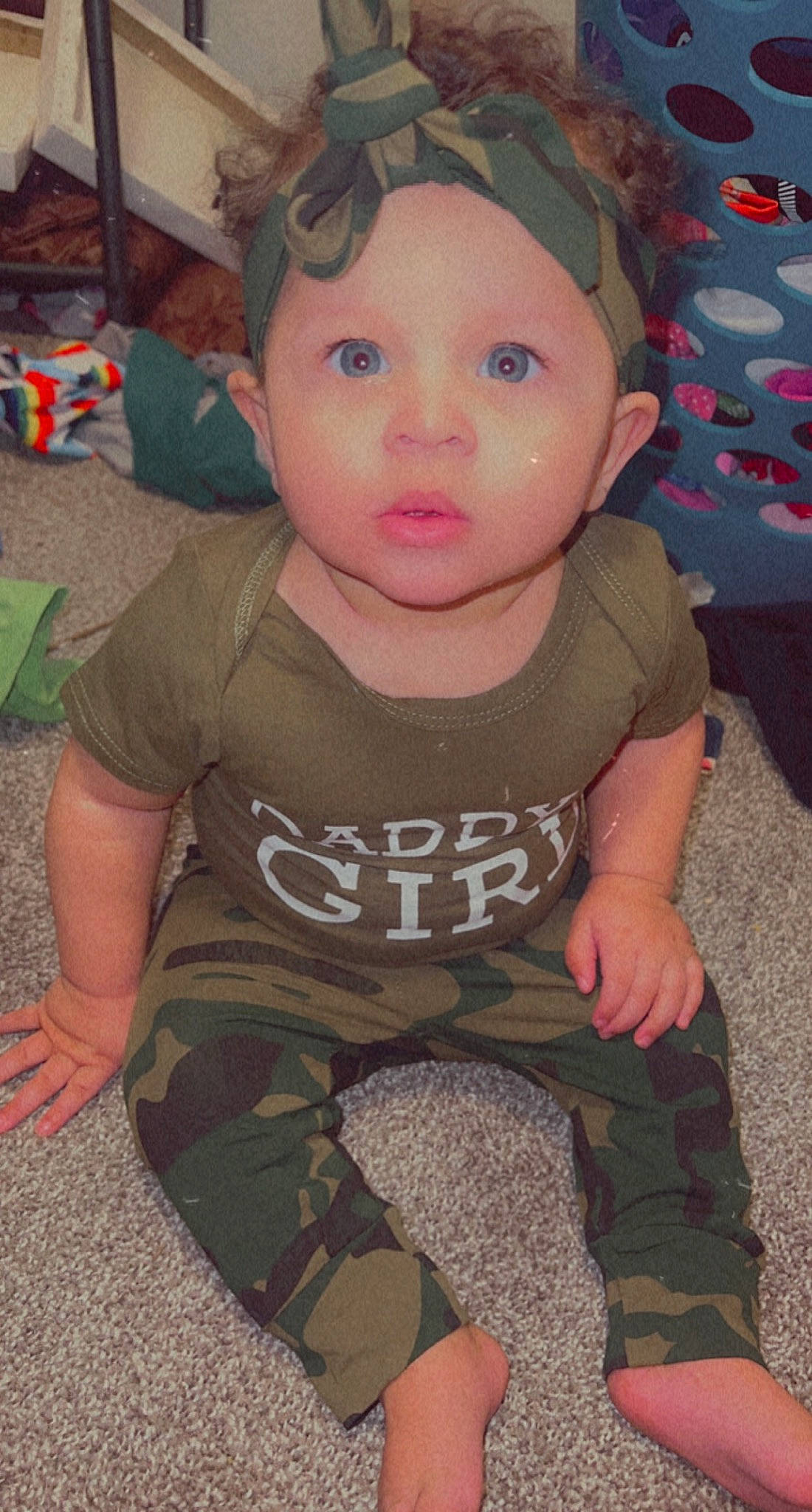 Nalayah is registered to the contest to win money with this photo: baby_toddler_clothing, cheek, cool, eyelash, facial_expression, finger, forehead, hairstyle, head, headwear, lip, mouth, neck, nose, organ, person, pink, skin, sleeve, t_shirt