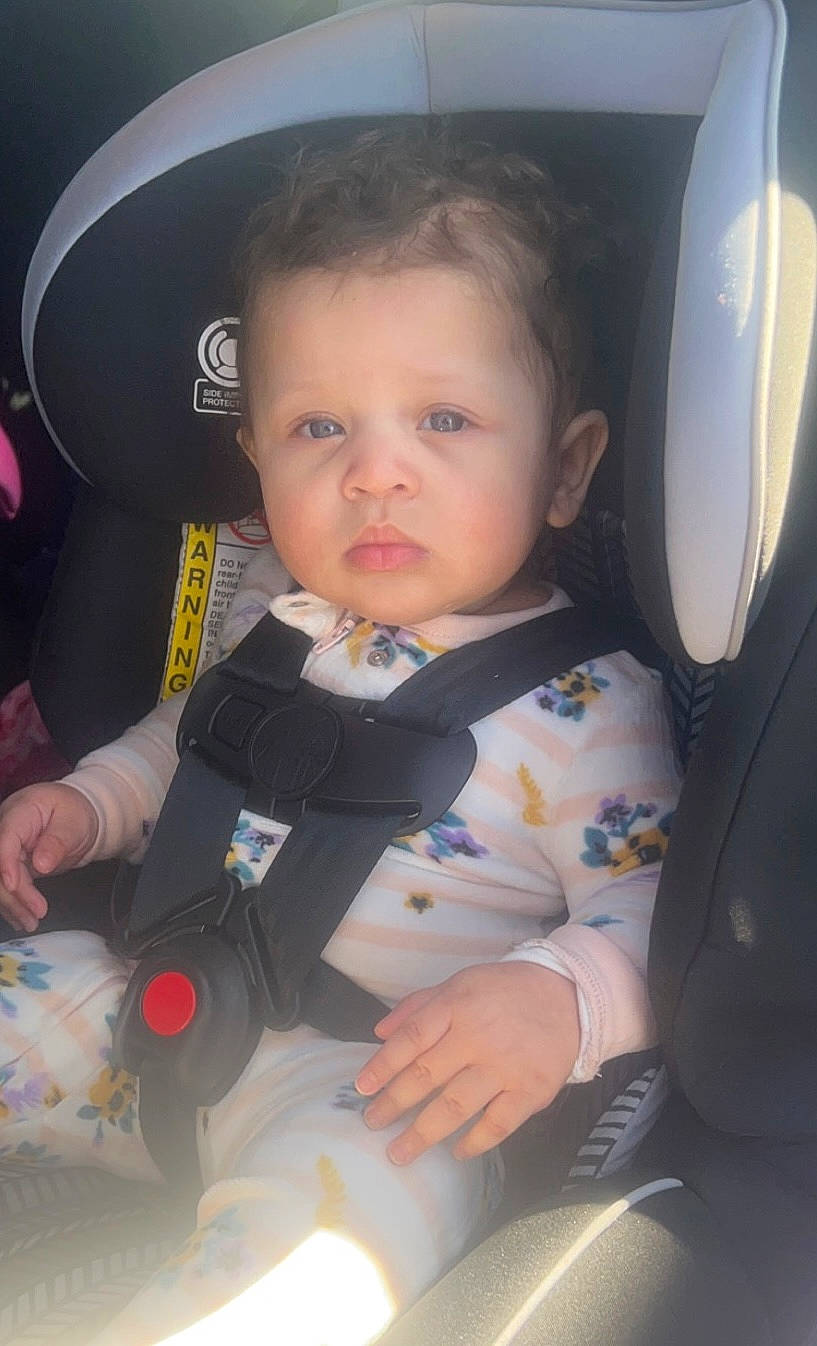 Nalayah is registered to the contest to win money with this photo: auto_part, automotive_design, baby, baby_carriage, baby_products, car_seat, car_seat_cover, child, face, family_car, fun, head, head_restraint, luxury_vehicle, person, seat_belt, sitting, toddler, vehicle_door, window
