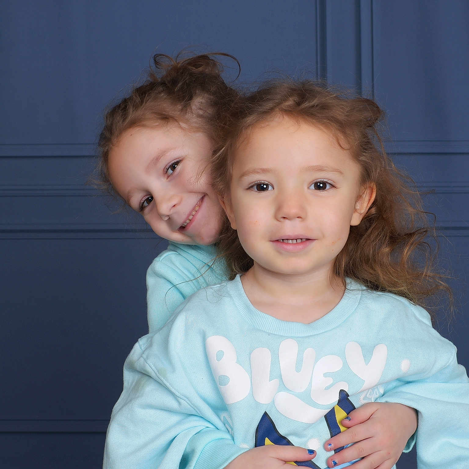 Anastazia is registered to the contest to win money with this photo: bodypart, child, clothing, face, female, finger, girl, hand, happy, head, knitwear, longsleeve, people, person, photography, portrait, sleeve, smile, sweater, t_shirt