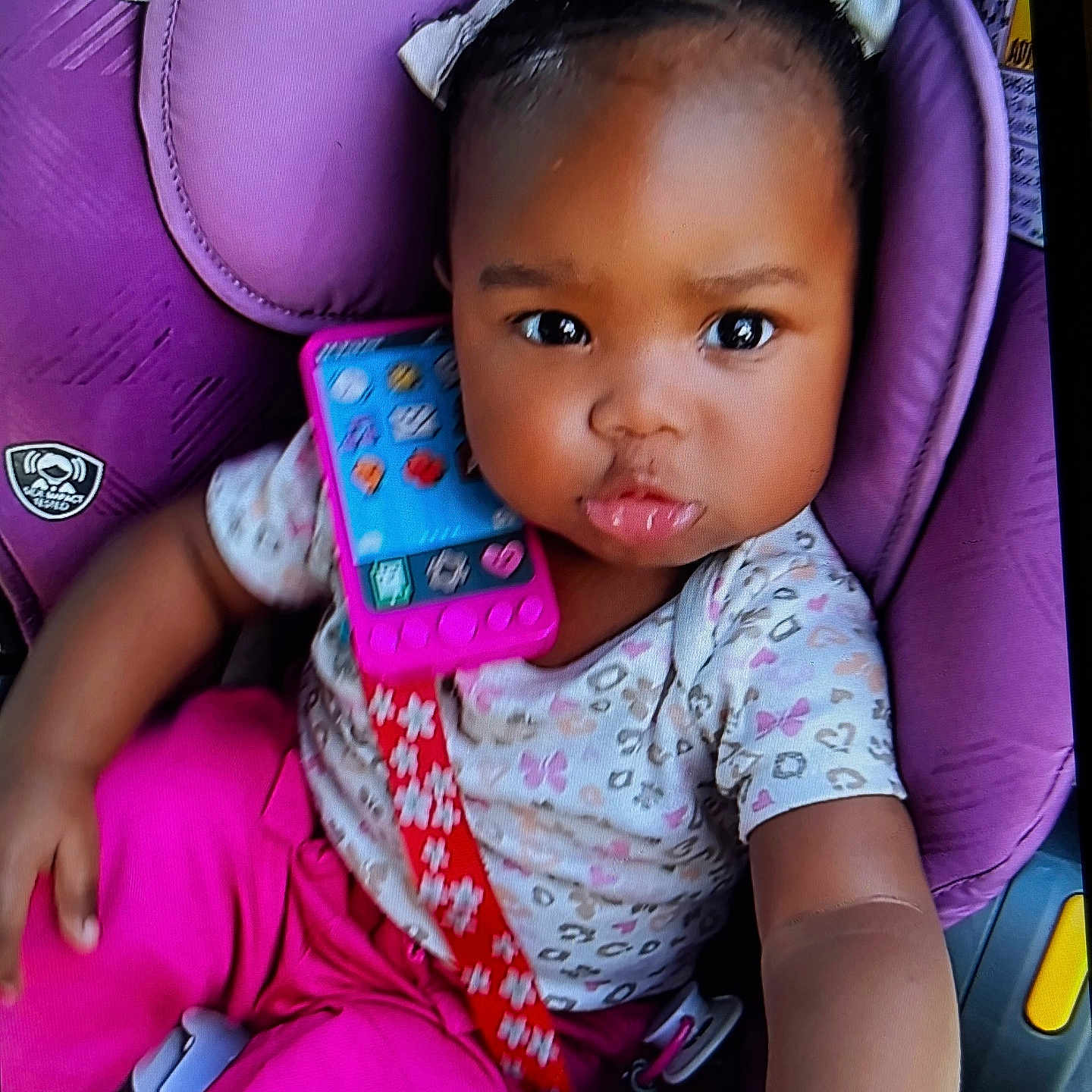 Tiarra joined the competition — help win amazing prizes! accessories, baby, car, couch, cushion, electronics, face, happy, head, homedecor, mobilephone, person, phone, photography, portrait, purple, selfie, smile, transportation, vehicle