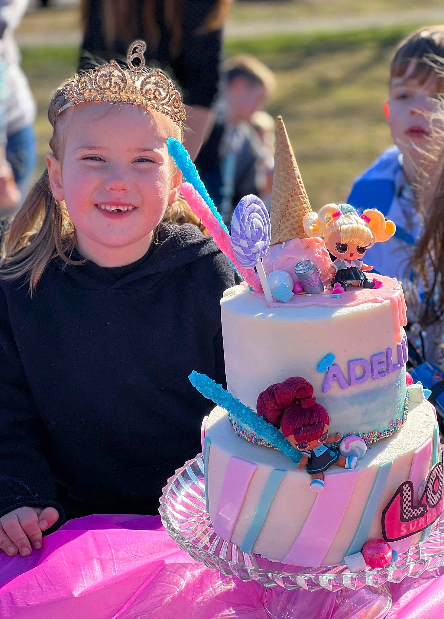 Adeline is registered to the contest to win money with this photo: baked_goods, birthday, birthday_cake, blue, cake, cake_decorating, cake_decorating_supply, child, dessert, event, food, fun, happy, headwear, joy, person, photograph, pink, purple, recreation