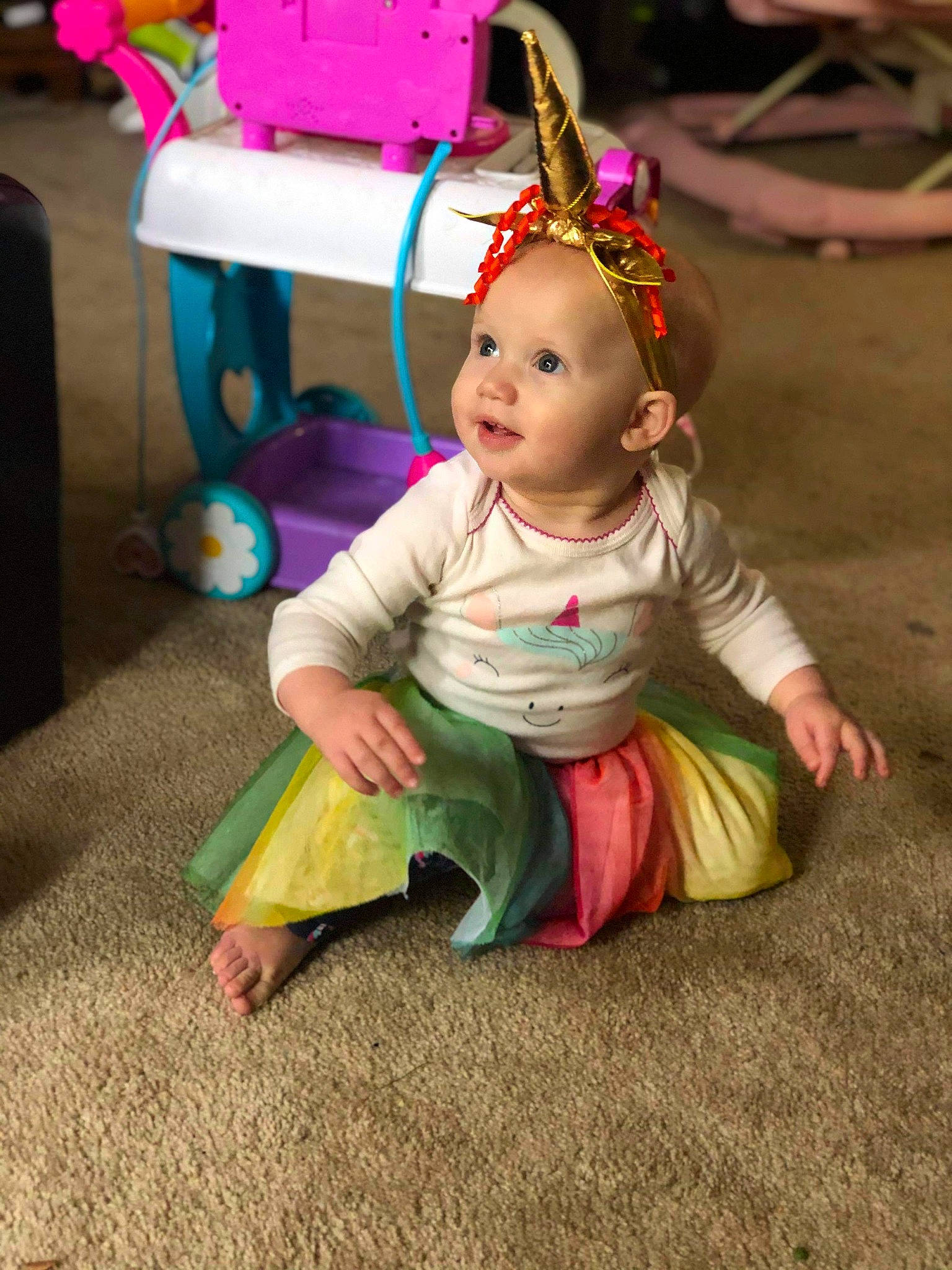 Layanna is registered to the contest to win money with this photo: baby, child, person, pink, play, sitting, smile, toddler