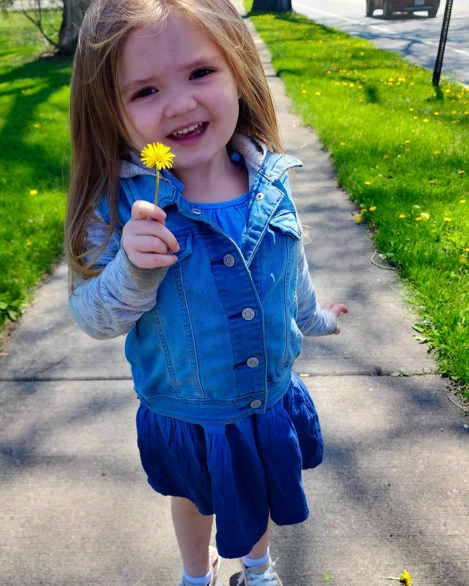 Ryleigh is registered to the contest to win money with this photo: baby_toddler_clothing, child, denim, electric_blue, facial_expression, grass, green, hairstyle, happy, head, iris, joy, lip, person, photograph, plant, sleeve, smile, standing, summer