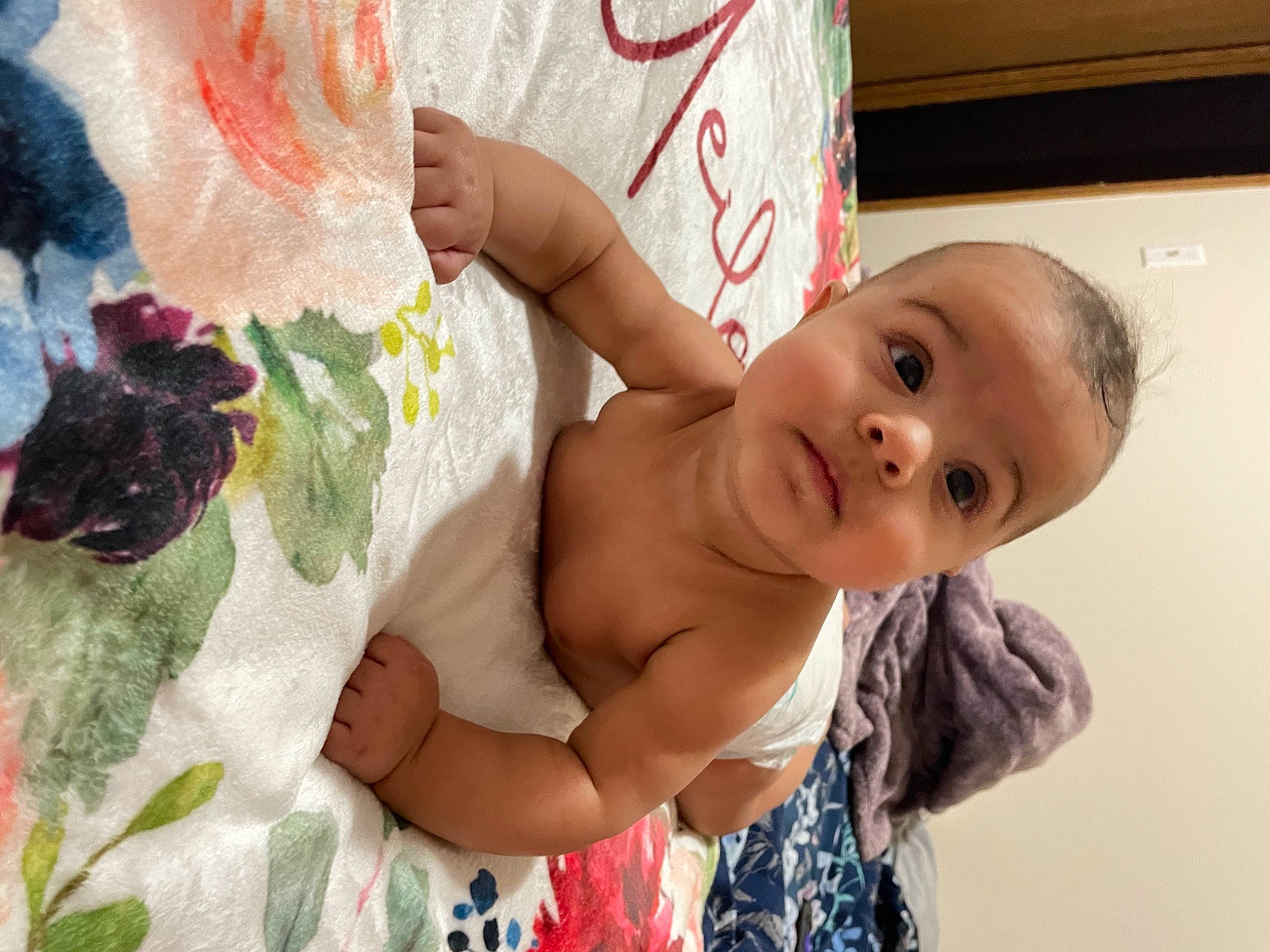 Meilani is registered to the contest to win money with this photo: abdomen, arm, baby, baby_toddler_clothing, cheek, chest, child, eye, fun, happy, human_body, linens, pattern, people, person, product, room, skin, thumb, toddler