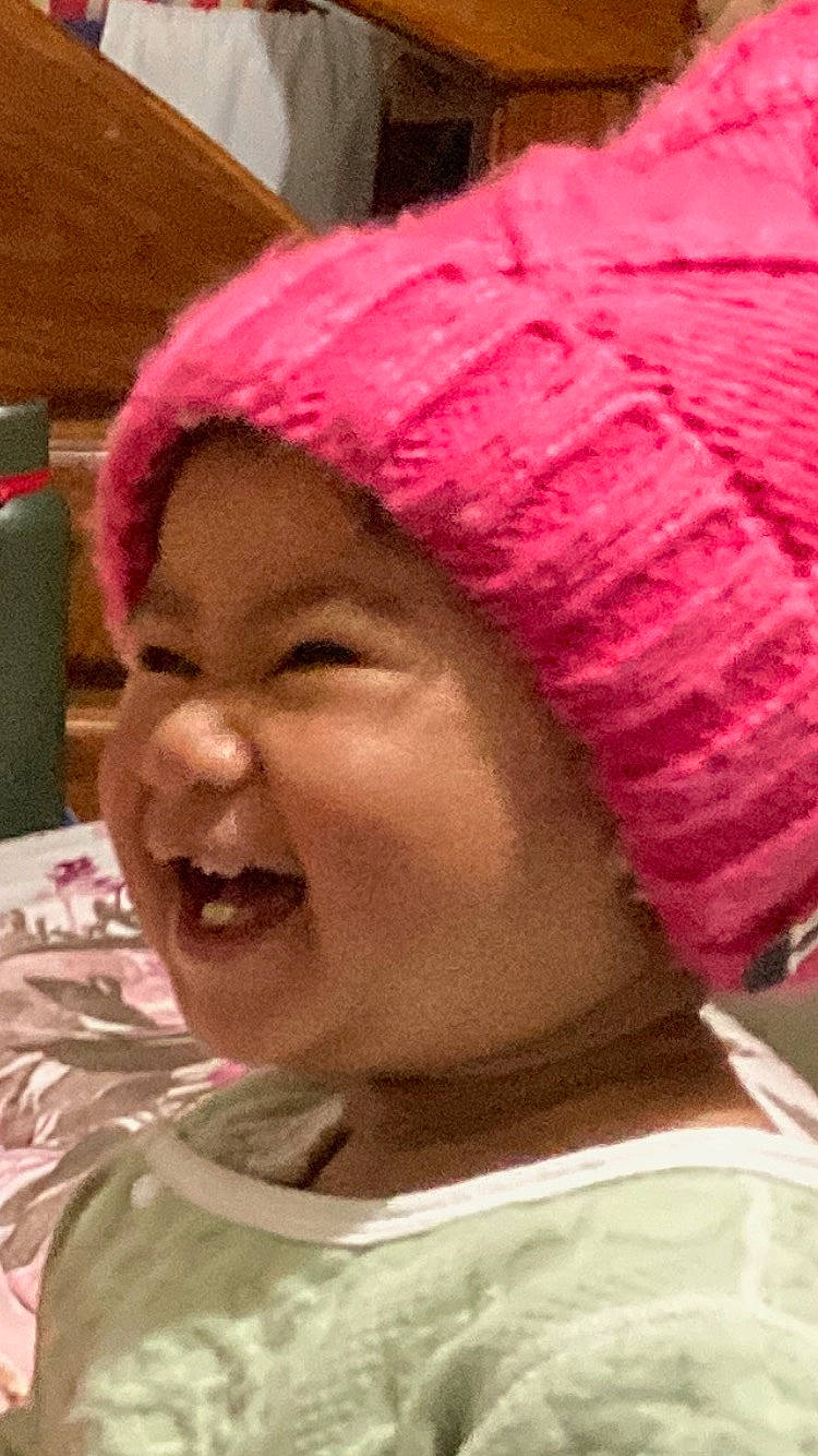 Melvin joined the competition — help win amazing prizes! beanie, cap, cheek, child, craft, crochet, fashion_accessory, fun, happy, headgear, headwear, knit_cap, lip, magenta, pattern, person, pink, smile, thread, toddler