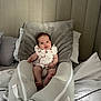 Lottie joined the competition — help win amazing prizes! baby, infant, lounger, bed, pillow, blanket, headboard, smiling, child, clothing, indoor, comfort, soft, cute, person, young, rest, sleeping_area, fabric, room
