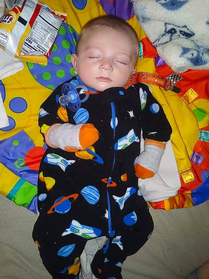 Konnor is registered to the contest to win money with this photo: baby, baby_products, baby_toddler_clothing, child, nap_mat, person, product, textile, toddler