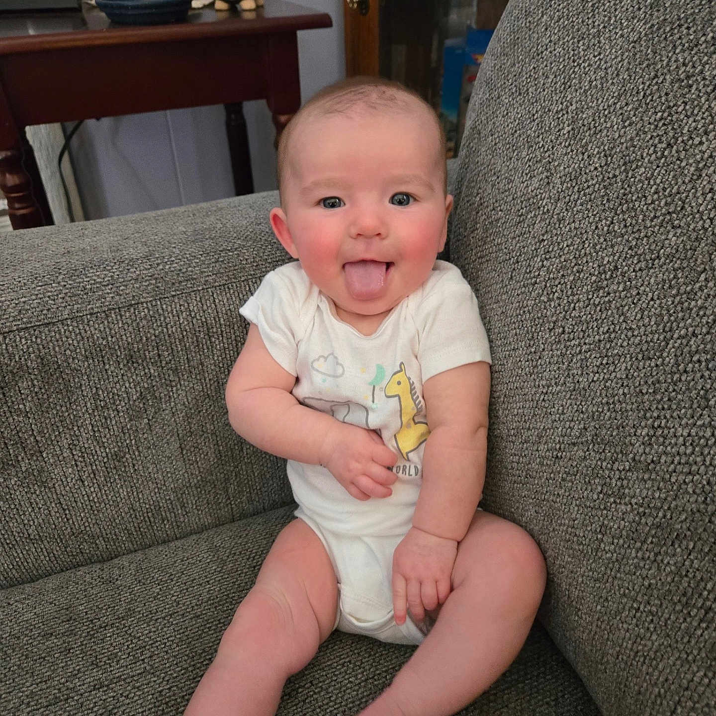 Allison joined the competition — help win amazing prizes! architecture, baby, building, chair, clothing, couch, cushion, face, furniture, happy, head, homedecor, indoors, livingroom, person, photography, portrait, room, sitting, t_shirt
