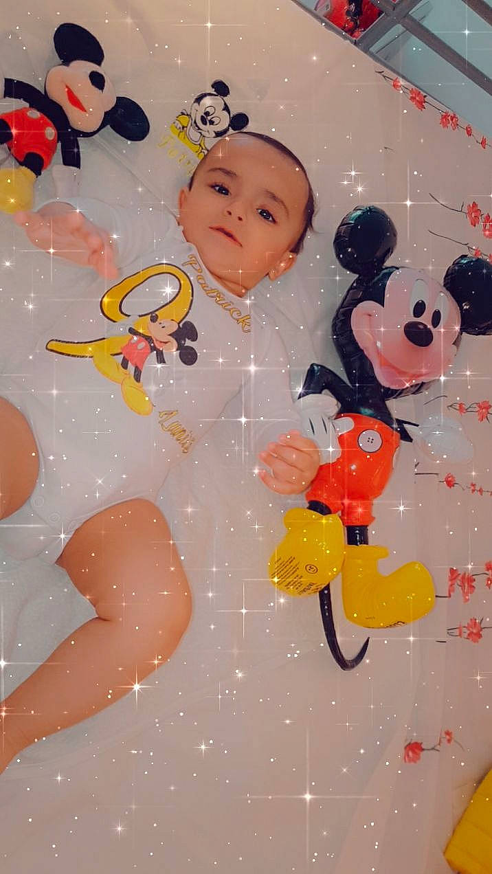 Patrick a rejoint le concours — aidez-le/la à gagner de superbes lots ! baby, baby_products, baby_toys, carmine, cheek, child, event, facial_expression, fun, happy, head, party_supply, pattern, person, pink, red, stuffed_toy, teddy_bear, textile, toddler