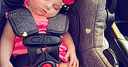 Phoenix is registered to the contest to win money with this photo: adorable, baby, car_interior, car_seat, child, cute, digital_effects, face, feet, hands, head, heart_shapes, infant, pacifier, pink_clothing, resting, safety, seatbelt, sleeping, straps