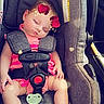 baby, car_seat, child, sleeping, pink_clothing, pacifier, straps, seatbelt, infant, cute, adorable, face, hands, feet, head, car_interior, safety, resting, digital_effects, heart_shapes