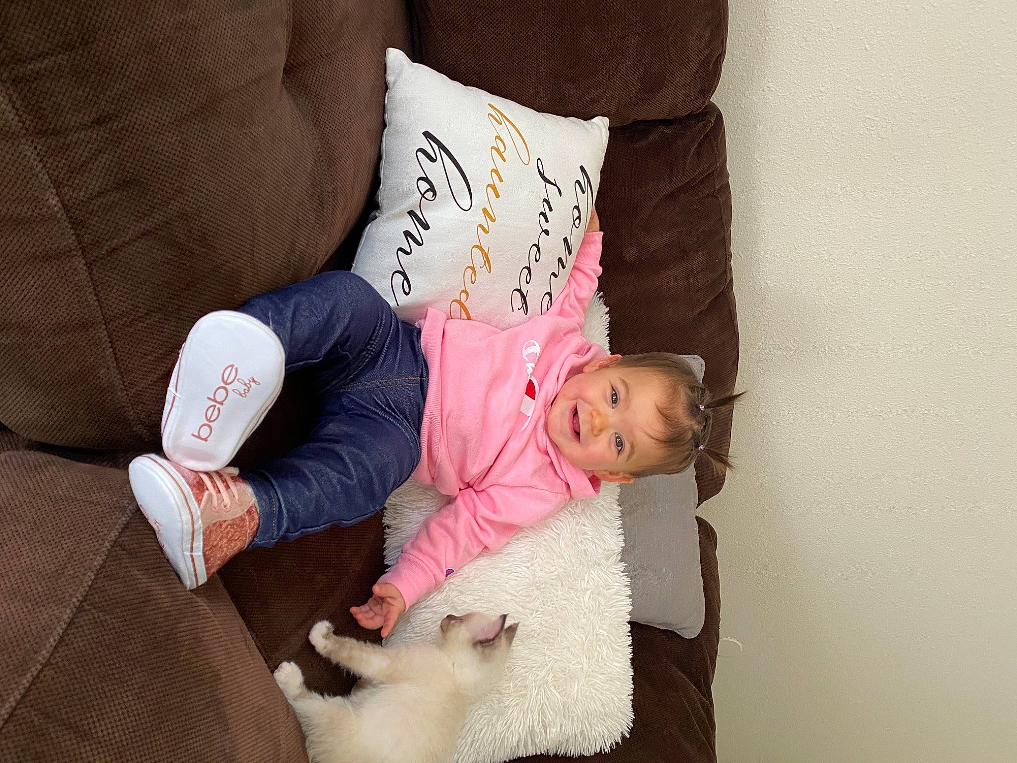 Ezlyn is registered to the contest to win money with this photo: baby, baby_toddler_clothing, comfort, cushion, fur, joy, person, pillow, pink, plush, stuffed_toy, throw_pillow