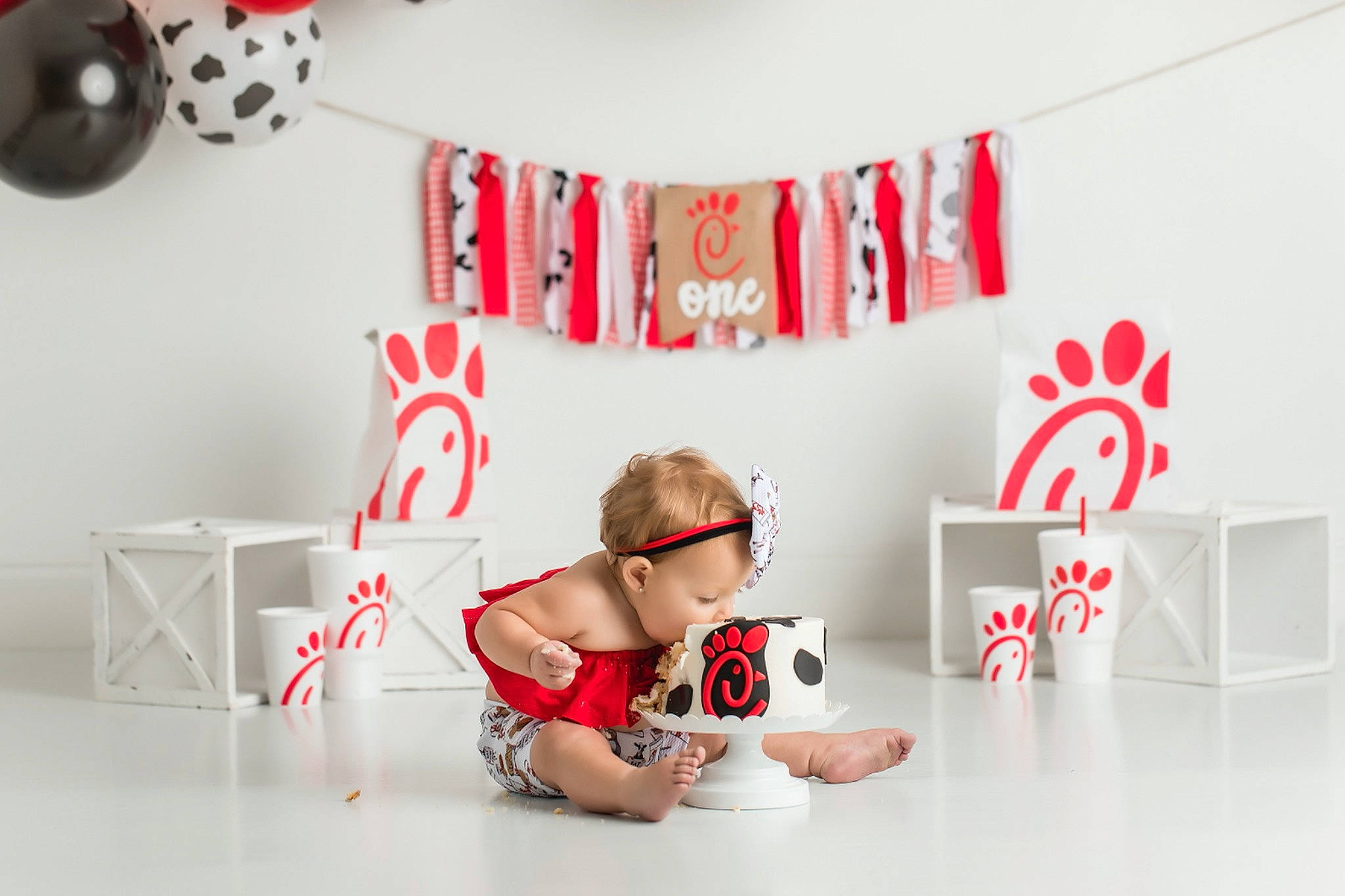 Paisley is registered to the contest to win money with this photo: baby, baby_toddler_clothing, carmine, child, comfort, font, happy, interior_design, knee, pattern, person, pink, product, red, room, sitting, t_shirt, textile, thigh, toddler