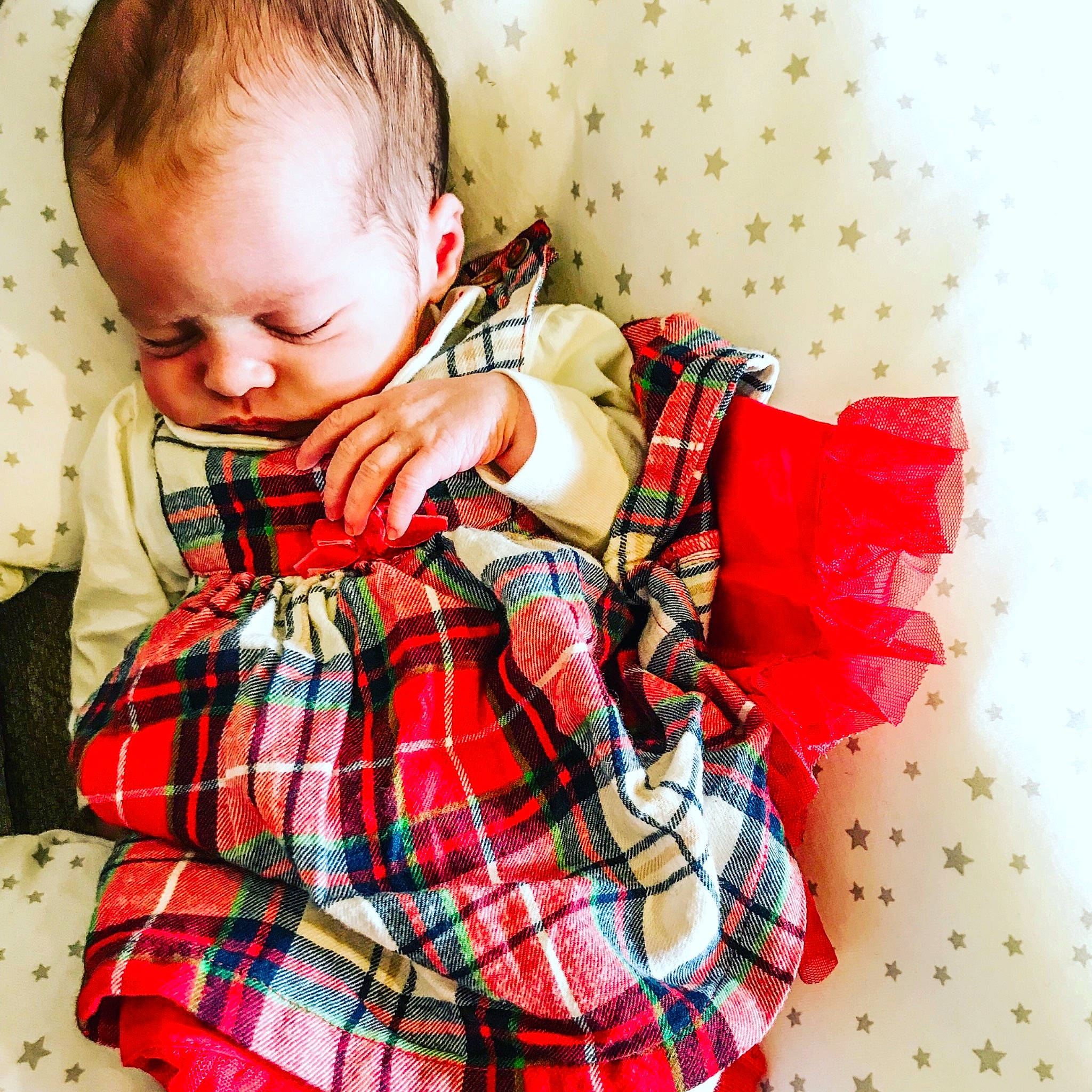Madeleine is registered to the contest to win money with this photo: child, design, infant, outerwear, pattern, person, plaid, product, tartan, textile, toddler