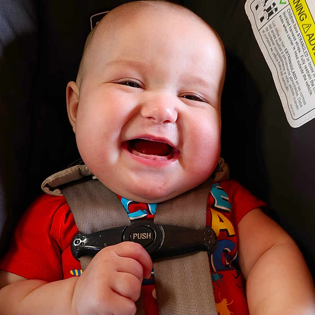 Asher joined the competition — help win amazing prizes! accessories, baby, babylaughing, bodypart, clothing, face, finger, hand, happy, head, homedecor, laughing, lifejacket, person, photography, portrait, smile, strap, text, vest