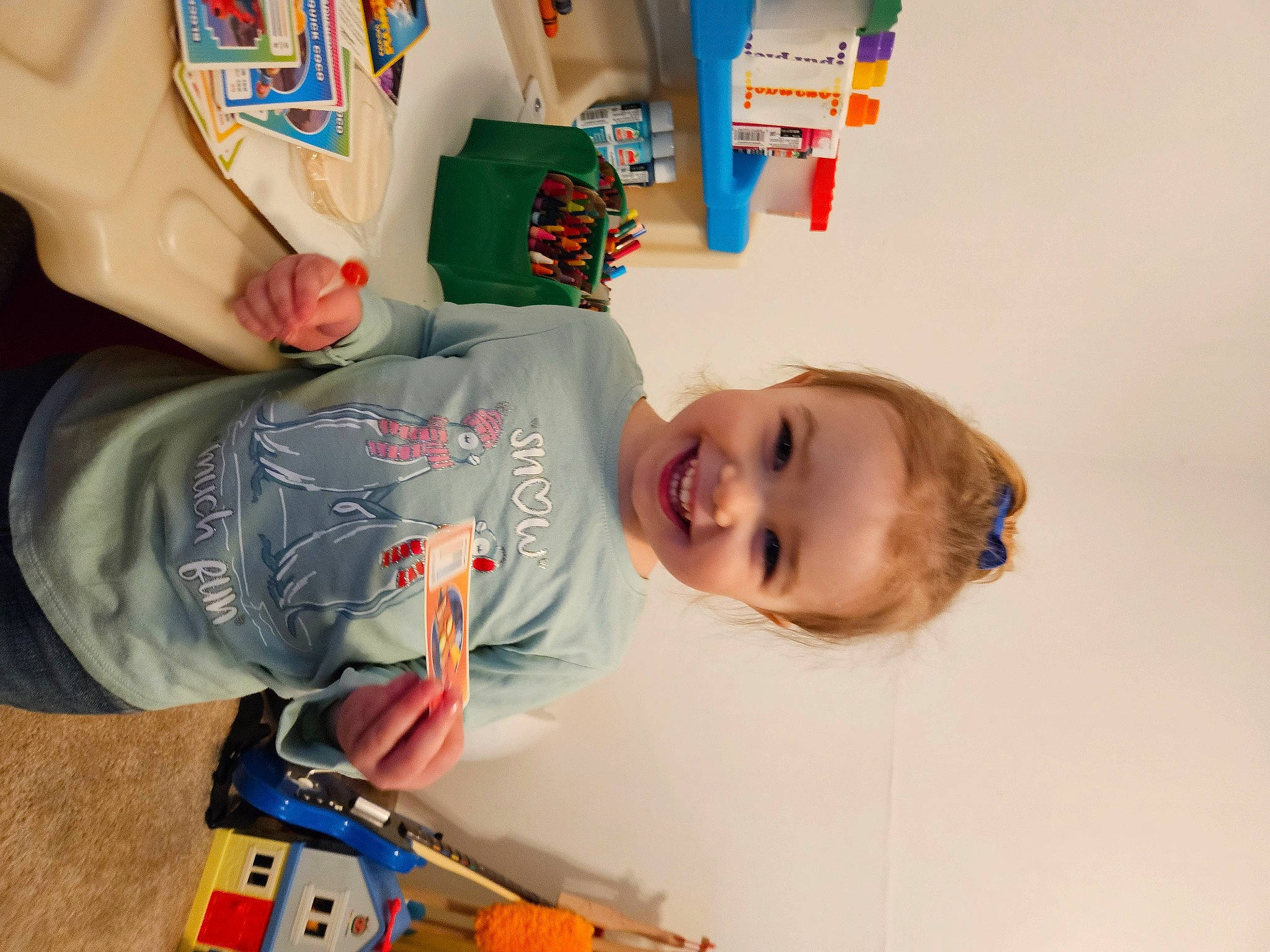 Willow joined the competition — help win amazing prizes! baby, baby_products, baby_toys, child, fun, happy, joy, orange, person, plastic, play, room, sitting, smile, t_shirt, toddler, toy, toy_vehicle