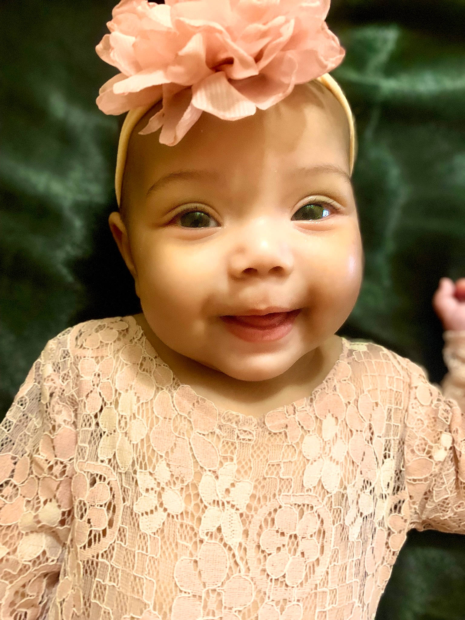Chanel Chestnut is registered to the contest to win money with this photo: baby, baby_toddler_clothing, cheek, chin, eyebrow, face, flower, forehead, happy, headgear, headpiece, human, iris, lip, person, petal, pink, skin, sleeve, smile