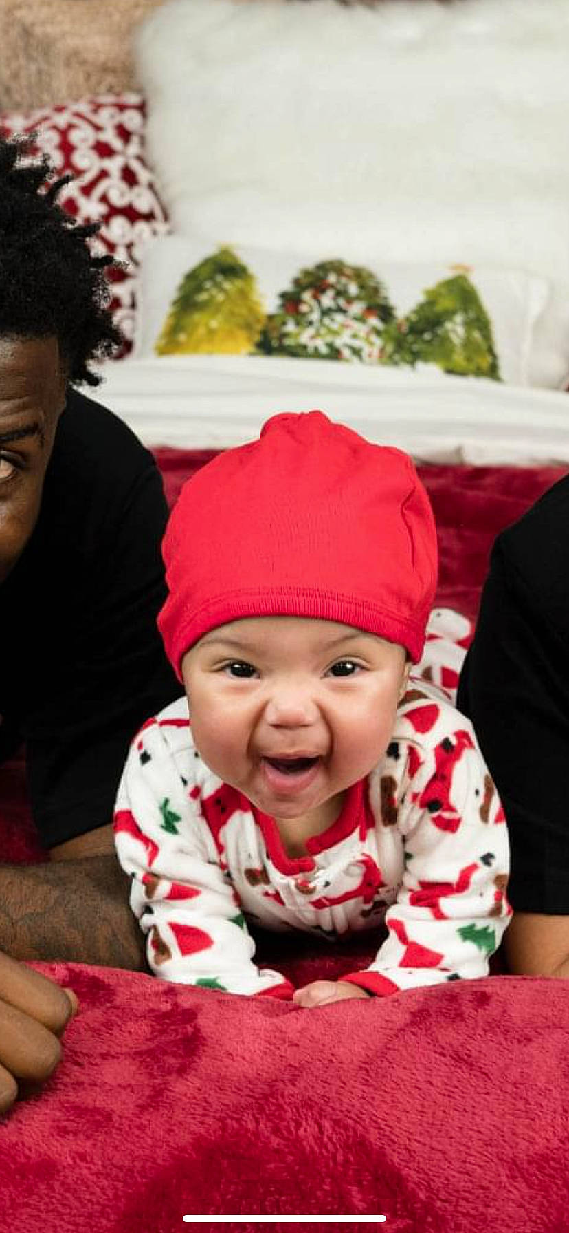 Chanel is registered to the contest to win money with this photo: baby, cap, child, comfort, event, fashion_accessory, fun, happy, headgear, headwear, holiday, human, knit_cap, magenta, organ, person, red, smile, snapshot, toddler