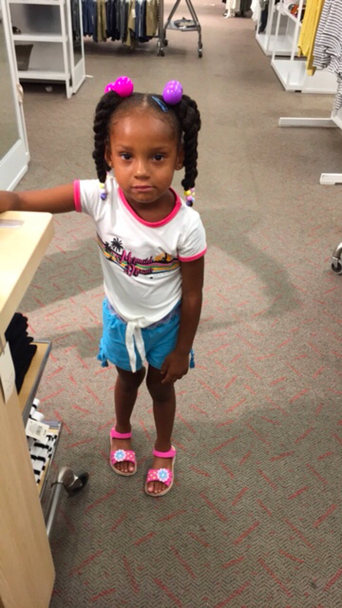 Sadie is registered to the contest to win money with this photo: ankle, baby_toddler_clothing, calf, child, flip_flops, flooring, foot, hair, human_leg, mouth, output_device, person, pink, sandal, shoe, slipper, sock, toddler, walking_shoe