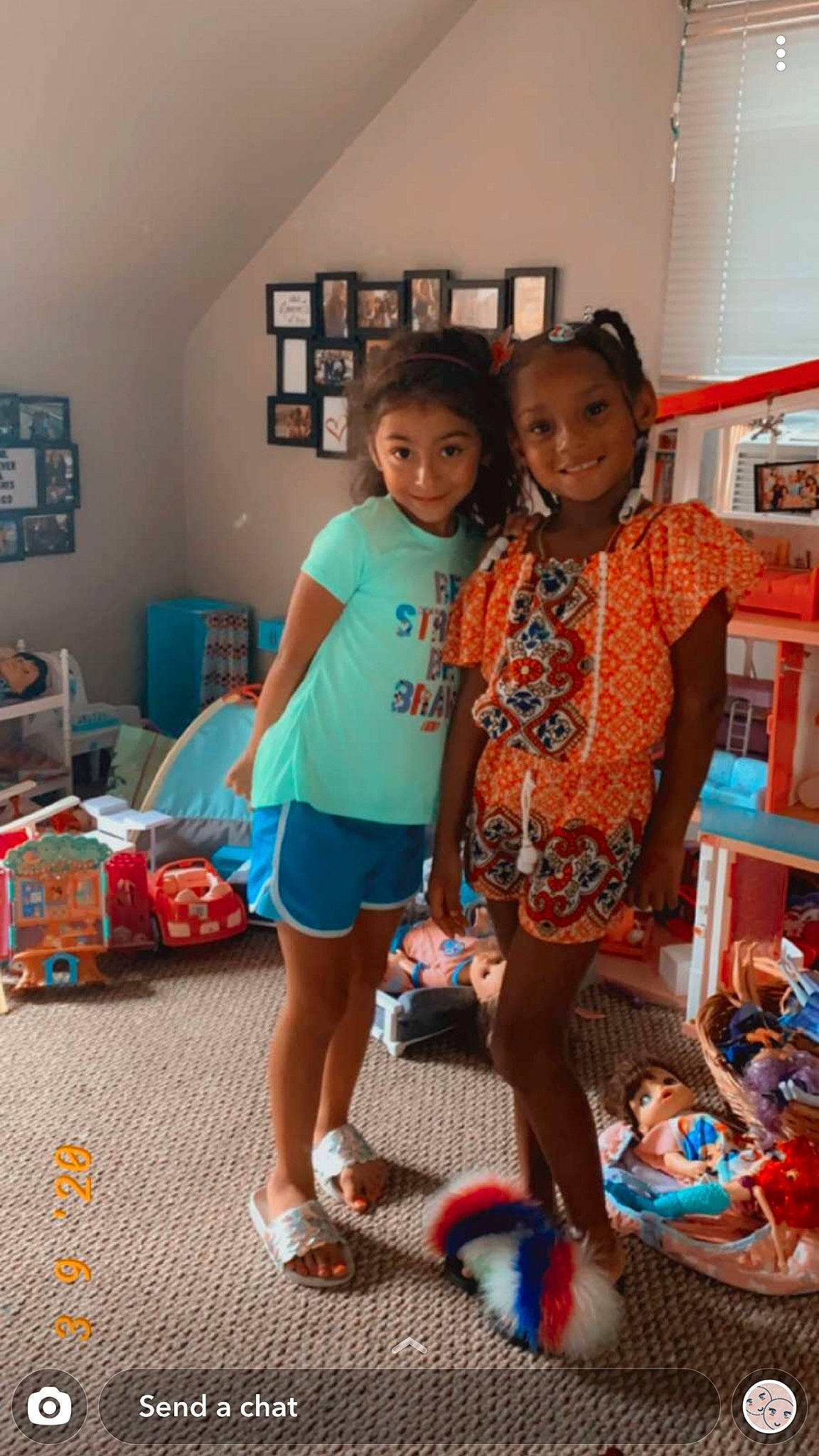 Sadie is registered to the contest to win money with this photo: ball, box, joy, one_piece_garment, person, picture_frame, play, sandal, shelf, shelving, thigh, toy