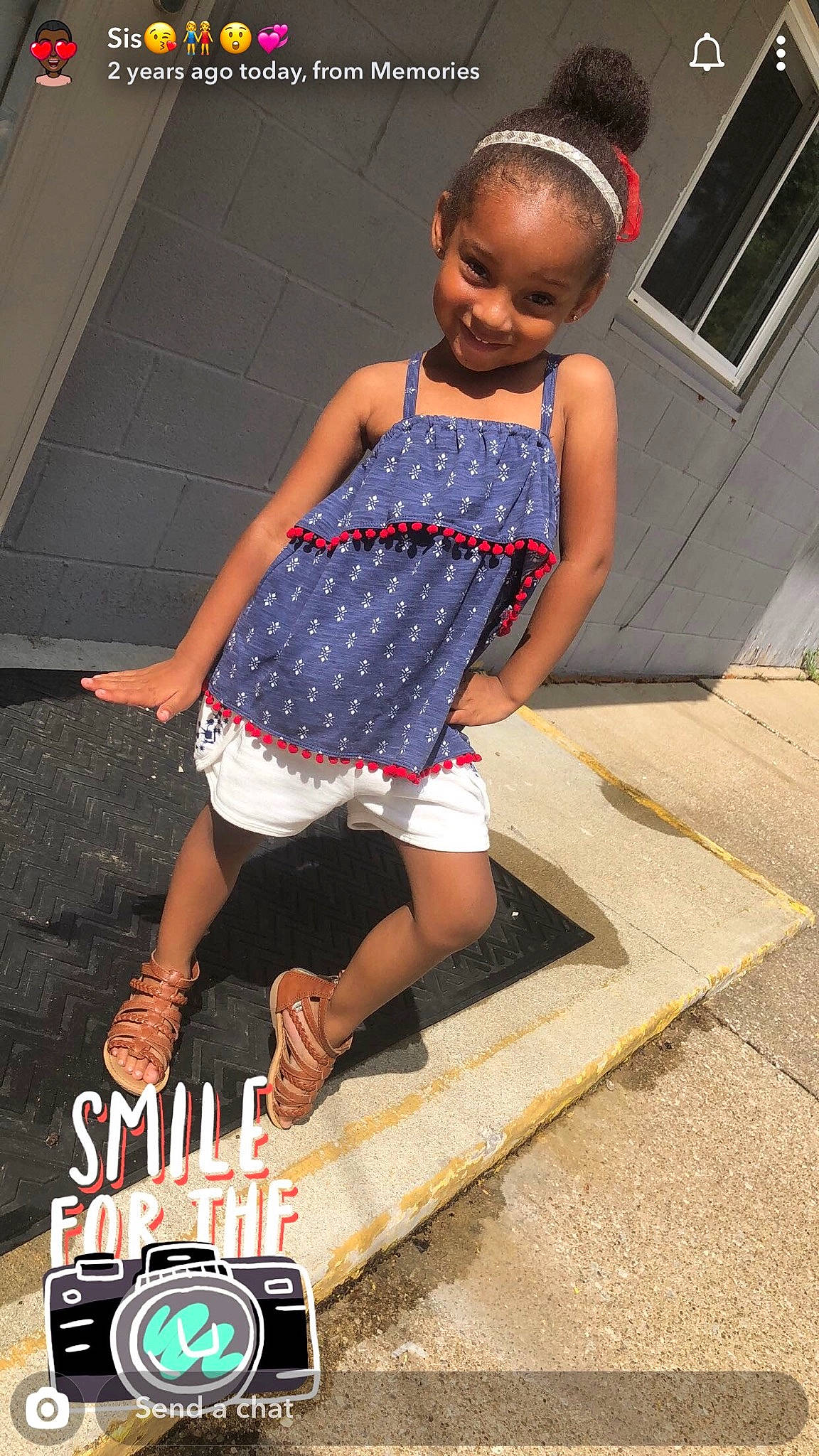 Sadie is registered to the contest to win money with this photo: ankle, baby_toddler_clothing, calf, child_model, clothing, day_dress, foot, hair_accessory, headband, headpiece, human_leg, joy, one_piece_garment, pattern, person, polka_dot, sandal, sock, stairs, street_fashion