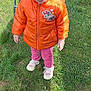 Lounah participe au concours pour gagner de l'argent avec cette photo : casual_clothing, child, curly_hair, cute, daylight, folding_chair, grass, orange_jacket, outdoor, person, pigtails, pink_pants, pink_sunglasses, playful, shoes, smiling, standing, sunlight, toddler, young_child