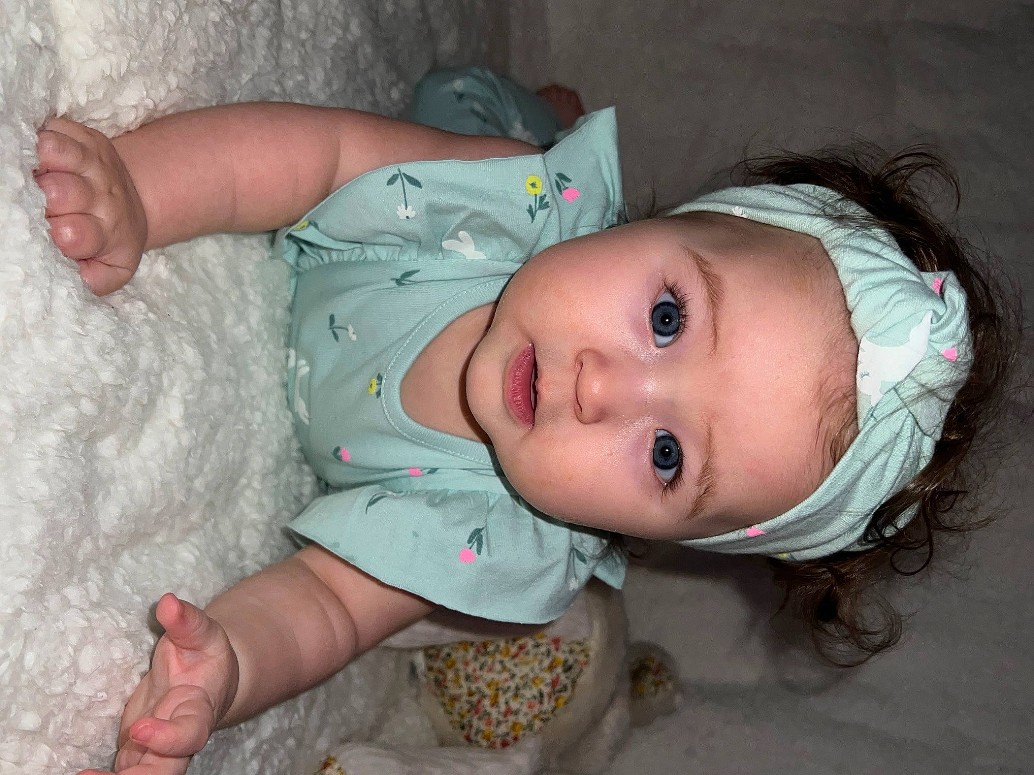 Letty is registered to the contest to win money with this photo: baby, baby_toddler_clothing, cheek, chest, child, chin, eyelash, finger, headgear, headwear, human_body, iris, lip, mouth, nose, person, sitting, skin, sleeve, smile