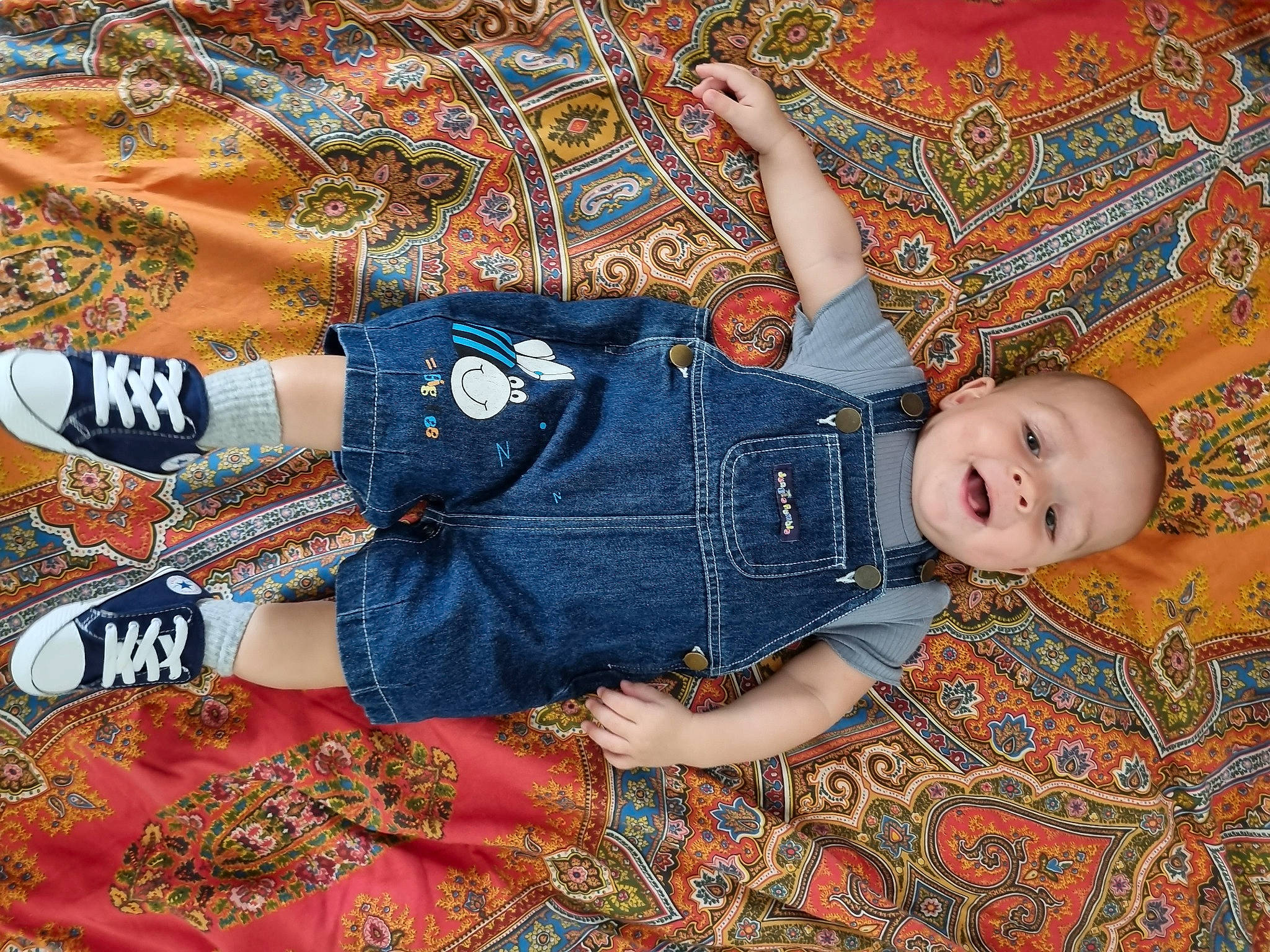 Sage joined the competition — help win amazing prizes! art, baby, baby_toddler_clothing, child, comfort, denim, electric_blue, fashion_accessory, flooring, fun, gesture, linens, pattern, person, plaid, sleeve, t_shirt, toddler, tree, visual_arts