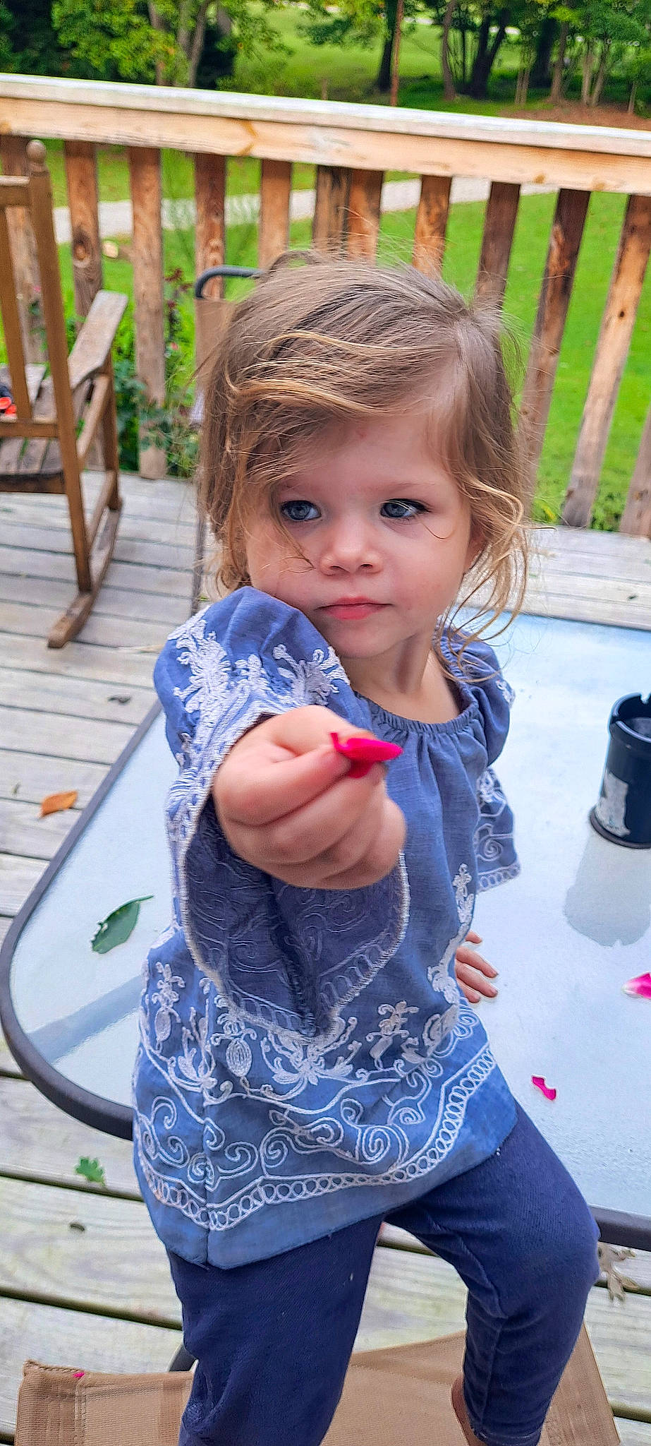 Skyler is registered to the contest to win money with this photo: baby_toddler_clothing, child, electric_blue, fun, grass, happy, head, leisure, nail, person, plant, plastic_bottle, play, recreation, sitting, t_shirt, thumb, toddler, vacation, vegetable