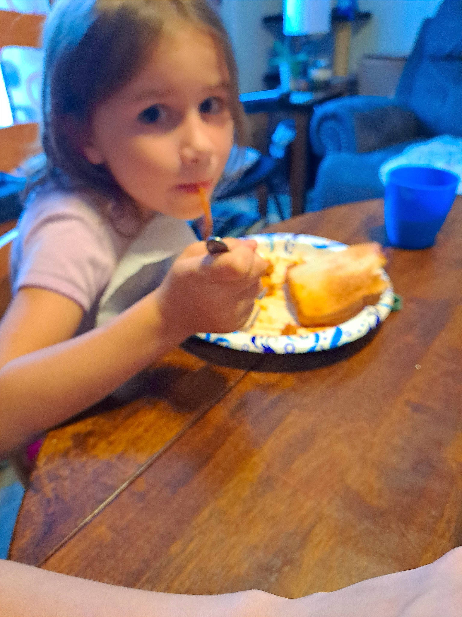 Ashlynn is registered to the contest to win money with this photo: baked_goods, blue, cake, chair, child, comfort_food, cuisine, dessert, dish, fast_food, finger_food, food, food_craving, ingredient, junk_food, person, plate, sweetness, table, tableware