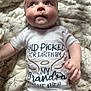 Tommy joined the competition — help win amazing prizes! baby, infant, onesie, clothing, text, face, hand, blanket, pattern, cute, lying_down, expression, skin, person, child, indoors, soft, newborn, portrait, apparel
