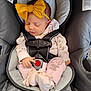 Raven is registered to the contest to win money with this photo: baby, infant, car_seat, sleeping, bow_headband, pink_clothing, baby_socks, safety_harness, indoors, cute, child, small_hands, soft_fabric, resting, newborn, toddler, car_seat_strap, baby_girl, peaceful, clothing_pattern