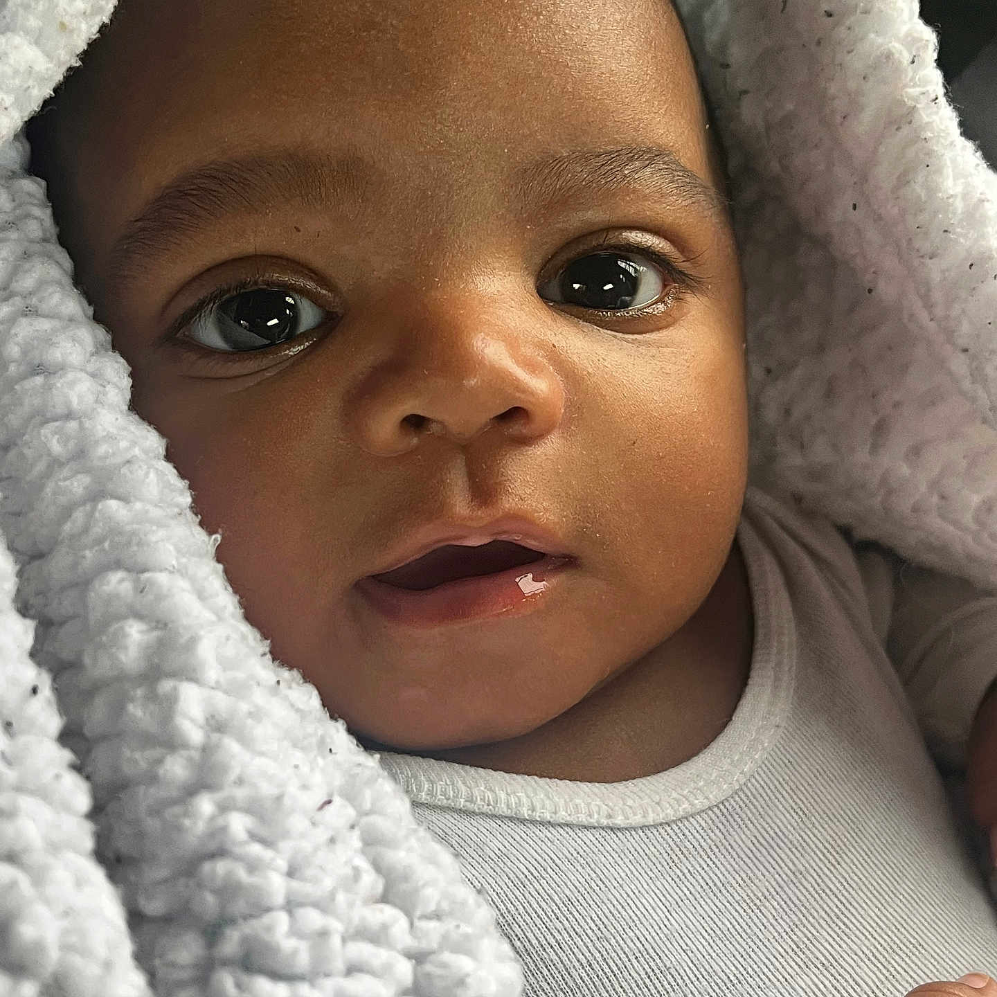 Phillip joined the competition — help win amazing prizes! adorable, baby, blanket, child, close_up, cozy, cute, expression, eyes, face, infant, newborn, portrait, skin, sleepwear, soft_texture, warm, white_clothing, wrapped, young