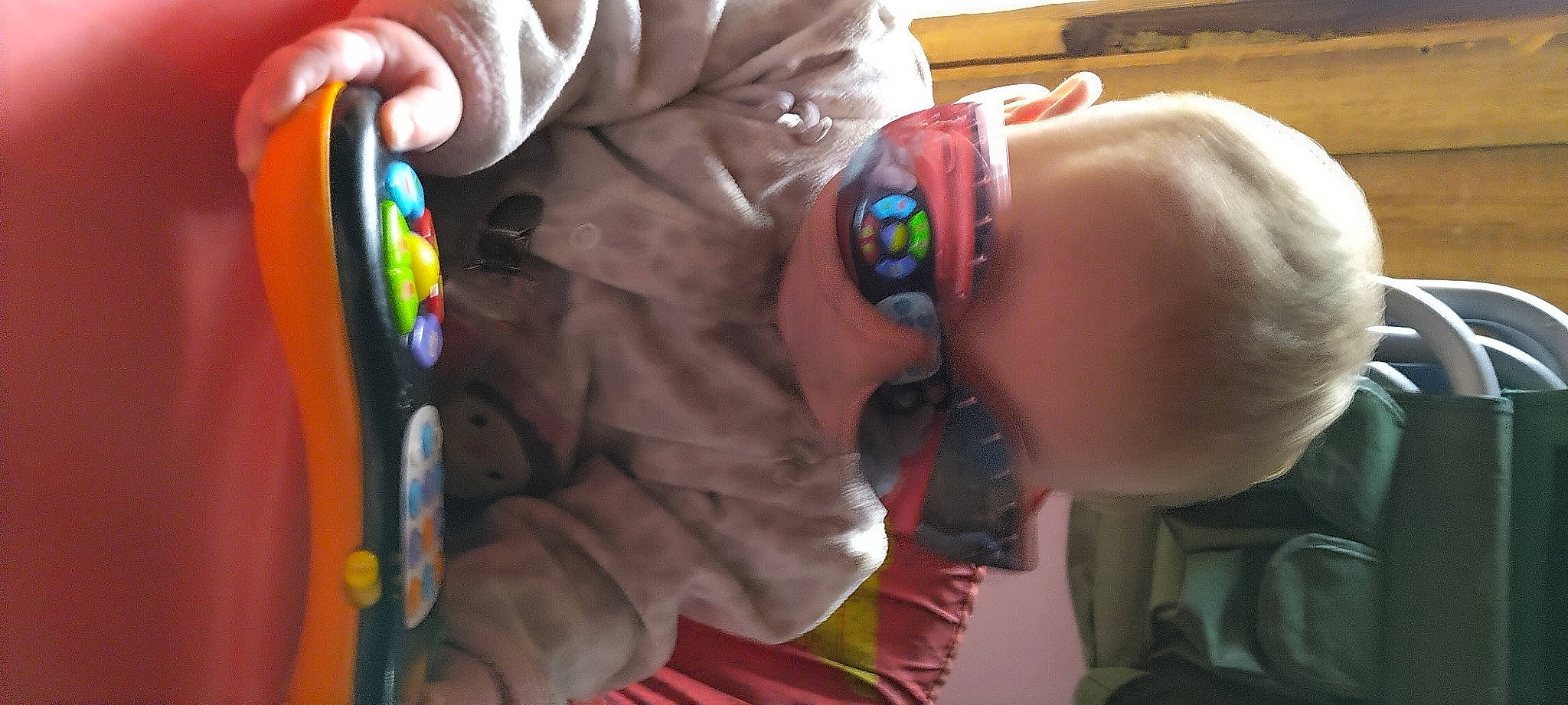 Starlynn joined the competition — help win amazing prizes! baby, baby_toddler_clothing, cheek, child, comfort, eyewear, finger, fun, human_body, mouth, nail, nose, orange, person, personal_protective_equipment, play, sleeve, smile, thumb, toddler