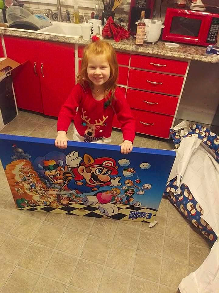 Lilith is registered to the contest to win money with this photo: bag, cabinetry, chest_of_drawers, child, cupboard, drawer, event, floor, flooring, fun, hardwood, holiday, interior_design, joy, pattern, person, photograph, room, smile, standing