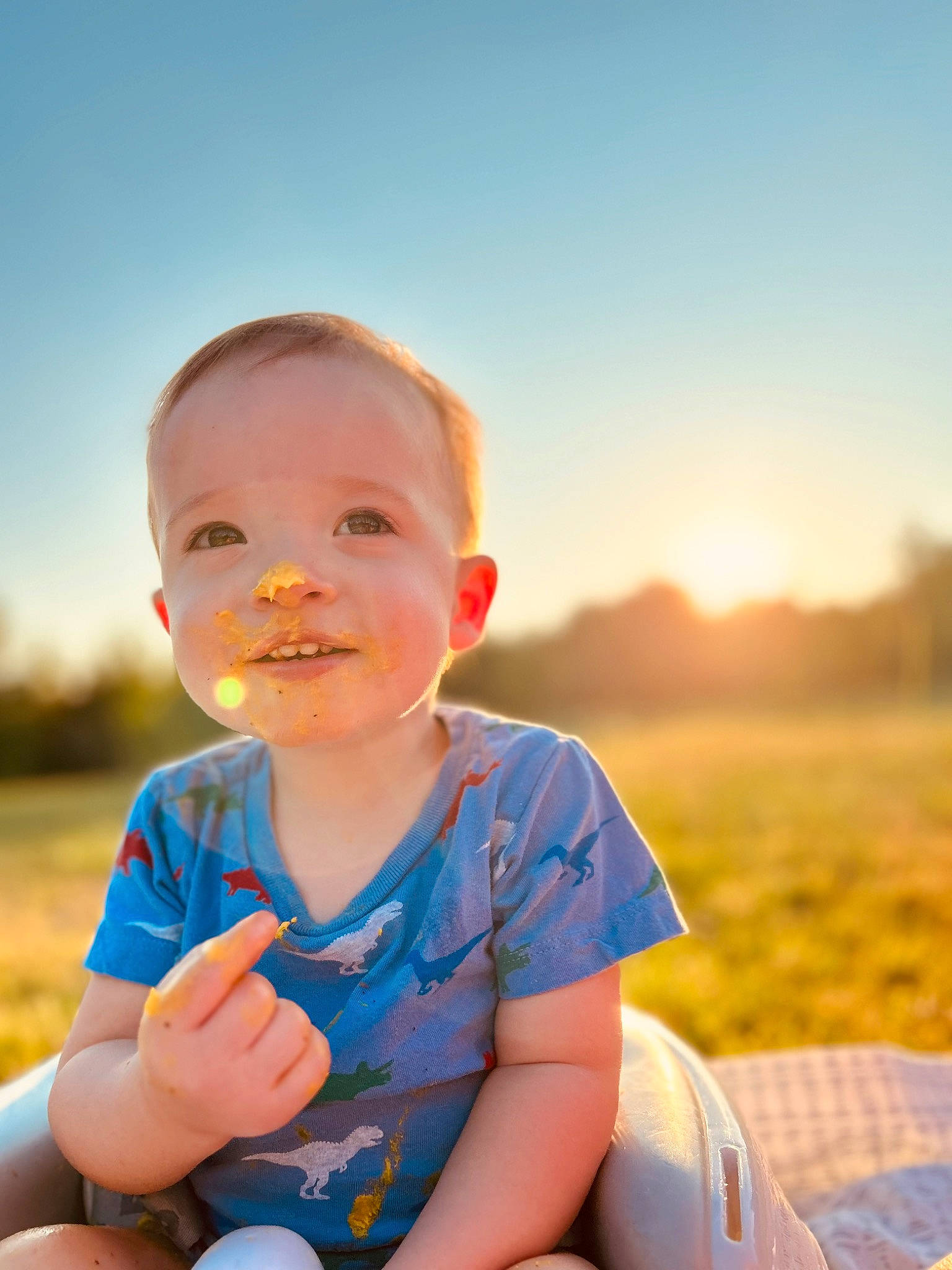 Daxton joined the competition — help win amazing prizes! baby, baby_toddler_clothing, child, electric_blue, flash_photography, fun, grass, grassland, happy, horizon, landscape, leisure, orange, people_in_nature, person, recreation, sitting, skin, sky, t_shirt