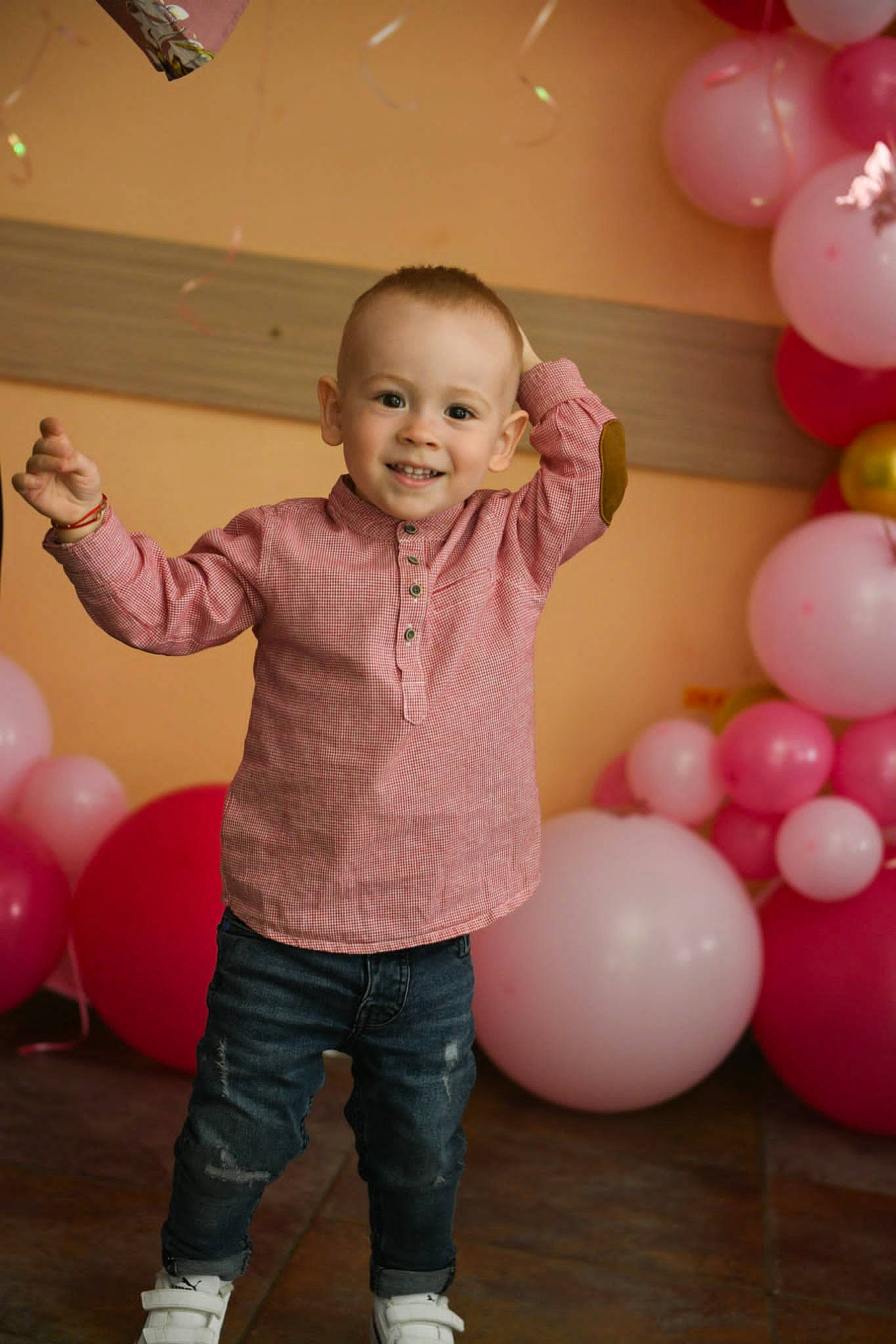 Mateo joined the competition — help win amazing prizes! arm, balloon, clothing, face, facial_expression, gesture, hair, hairstyle, happy, head, human, human_body, jeans, joint, joy, leg, mammal, organ, person, product