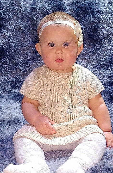 Elayna joined the competition — help win amazing prizes! art, baby, baby_toddler_clothing, cheek, child, embellishment, fashion_accessory, headgear, human_body, iris, jewellery, lip, nose, pattern, person, pink, sitting, skin, sleeve, textile