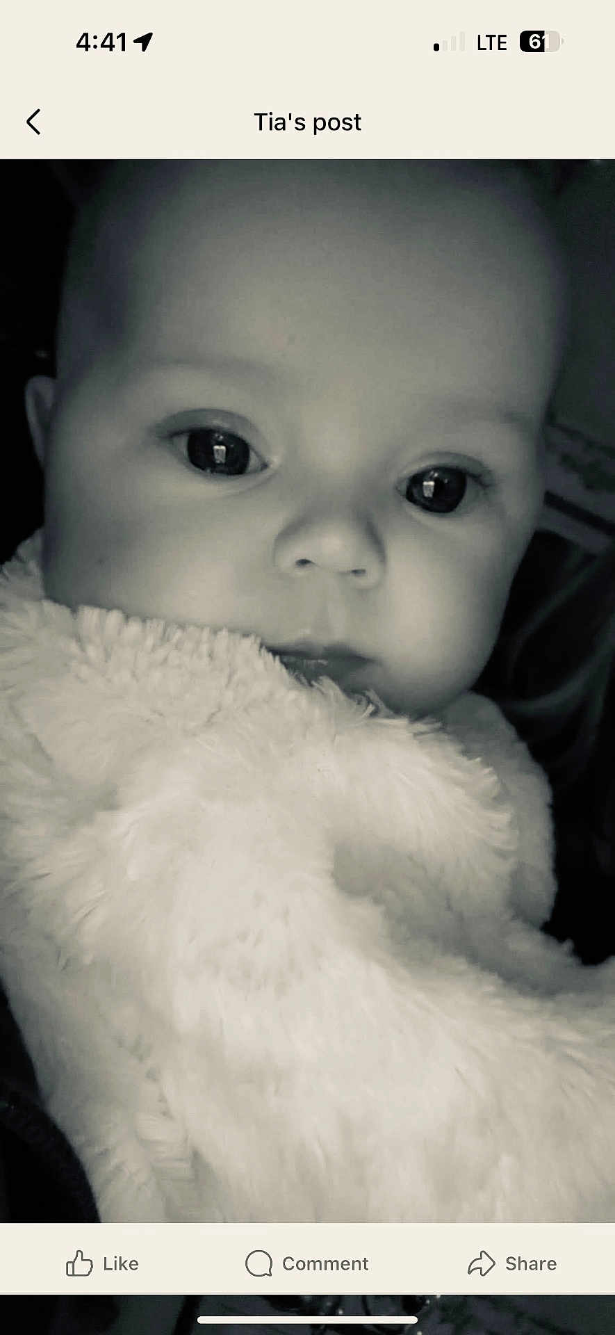 Weslynne joined the competition — help win amazing prizes! baby, infant, face, close_up, black_and_white, blanket, soft_texture, eyes, portrait, child, cute, warm, cozy, young, newborn, expression, indoor, person, head, fluffy