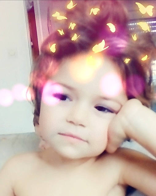 Elvira participe au concours pour gagner de l'argent avec cette photo : black_hair, brown_hair, cheek, child, chin, ear, eyebrow, eyelash, face, forehead, girl, hair_coloring, head, human_hair_color, lip, nose, person, purple, skin