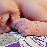 Draven is registered to the contest to win money with this photo: baby, baby_sleeping, bedtime, birth, cheek, child, close_up, eye, face, finger, gesture, hand, lip, mouth, nail, nap, nose, skin, sleep, toddler