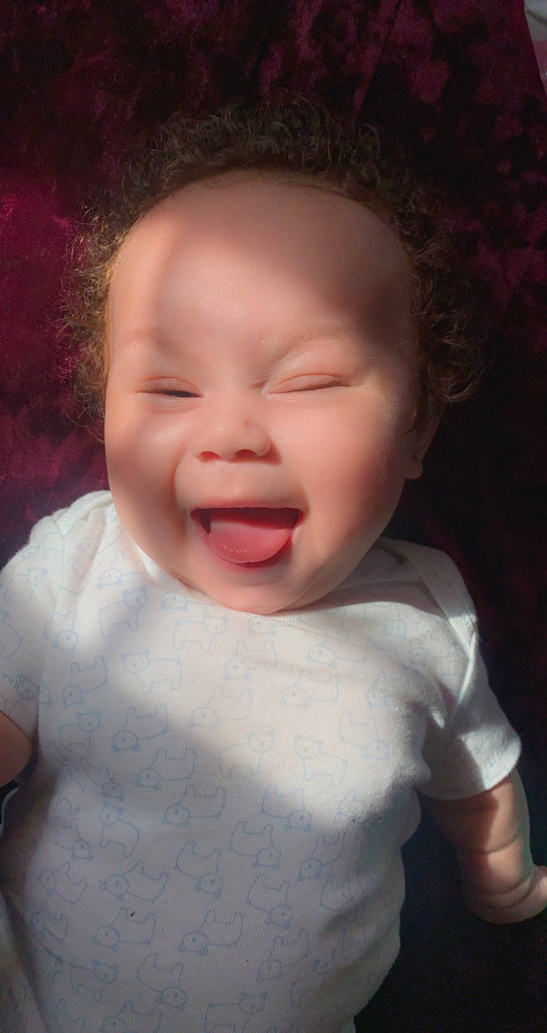 Kaleb is registered to the contest to win money with this photo: baby, baby_laughing, cheek, eyebrow, eyelash, flash_photography, forehead, gesture, happy, iris, jaw, lip, mouth, neck, nose, person, skin, sleeve, smile, toddler