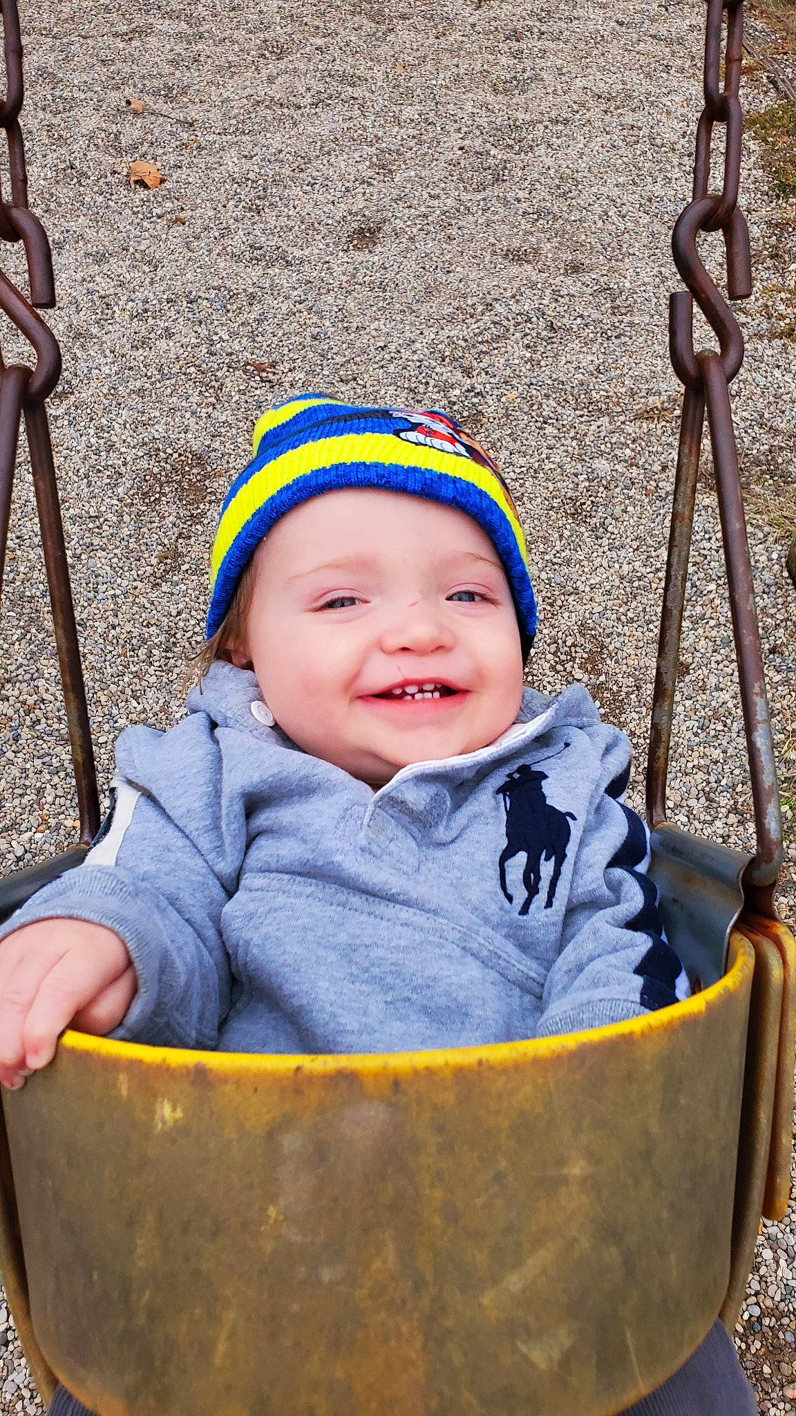 Corbyn joined the competition — help win amazing prizes! baby, child, headwear, joy, outdoor_play_equipment, person, product, smile, swing, toddler