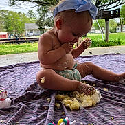 Gia is registered to the contest to win money with this photo: architecture, backyard, building, cream, dessert, face, food, grass, head, icing, nature, outdoors, park, person, photography, plant, portrait, shelter, summer, yard