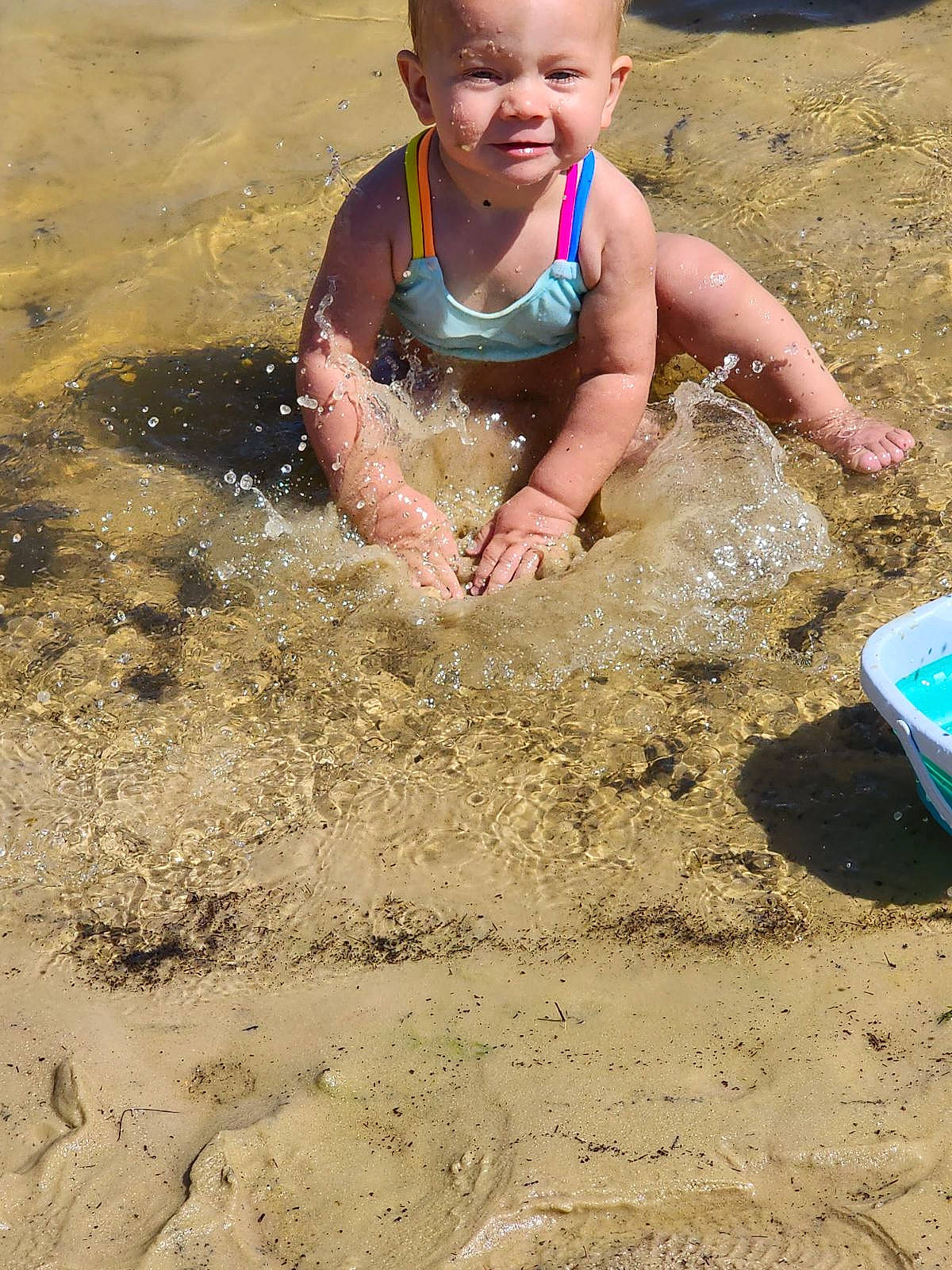 Laney joined the competition — help win amazing prizes! beach, building_material, building_sand_castles, child, fun, joy, leisure, mud, people_on_beach, person, play, recreation, sand, smile, soil, summer, t_shirt, toddler, water