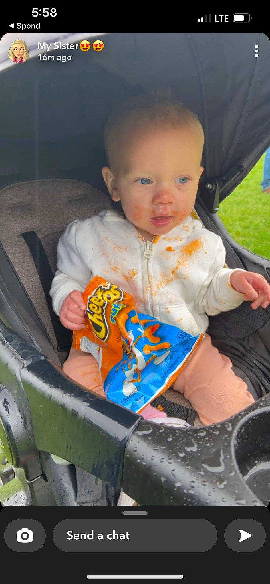 Laney is registered to the contest to win money with this photo: automotive_tire, baby, baby_carriage, baby_products, baby_toddler_clothing, bib, chair, cheek, child, comfort, fun, grass, happy, iris, lap, person, play, sitting, sleeve, t_shirt