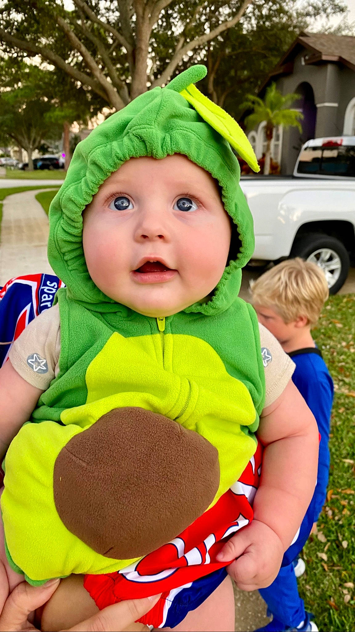 Dallas joined the competition — help win amazing prizes! baby, baby_toddler_clothing, cap, car, child, costume_hat, fun, grass, green, happy, hat, headgear, headwear, mammal, person, personal_protective_equipment, plant, t_shirt, tire, toddler